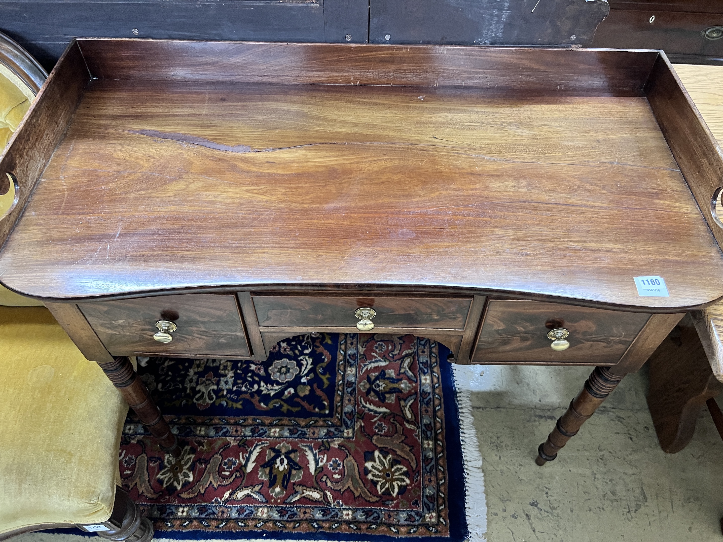 A Regency mahogany washstand, width 107cm